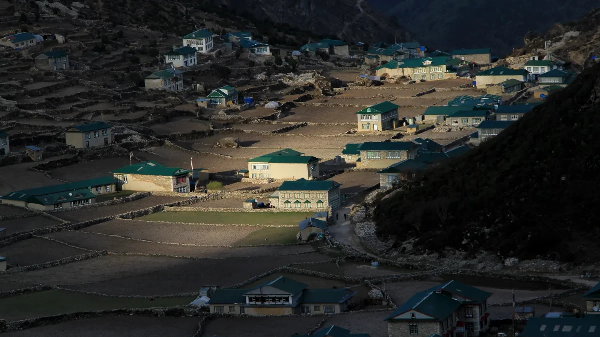 Stone buildings and green roofs in Khumjung village, Nepal